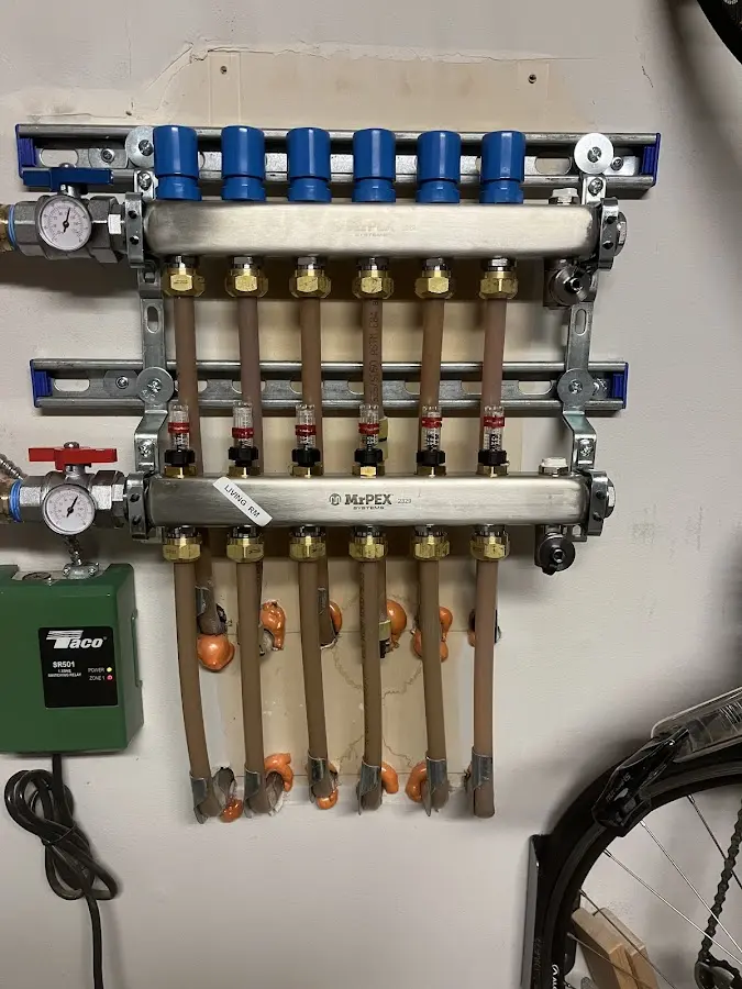 Plumber performing Water Heater Repair at a residential property in Highwood